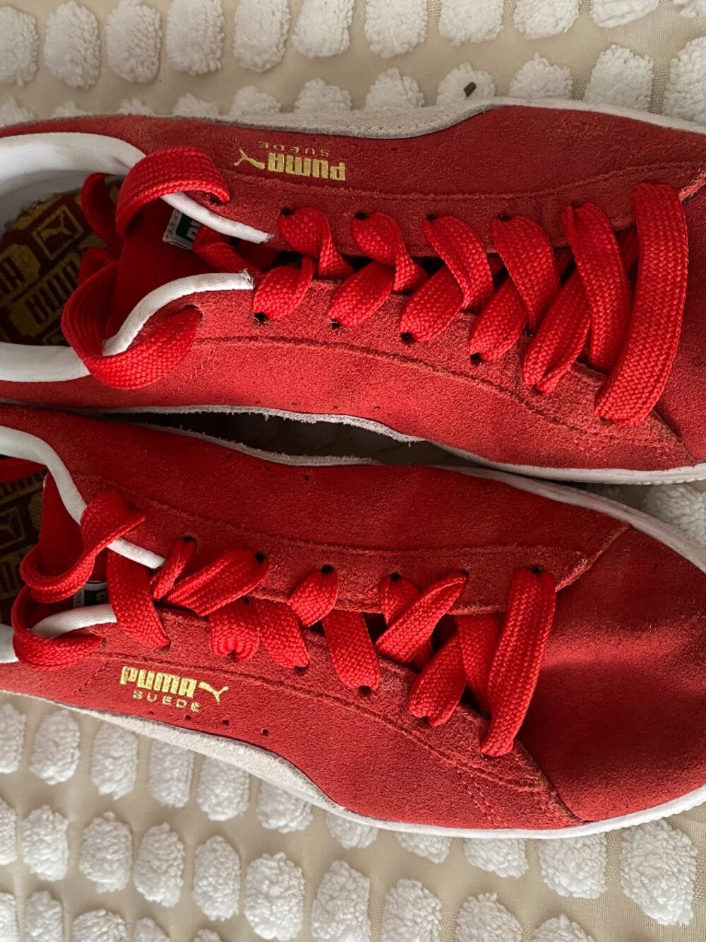 Cherry red Puma suede sneakers